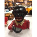 A VINTAGE CAST 'LITTLE JOE' MECHANICAL MONEY BANK BOX