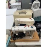 A RETRO SINGER SEWING MACHINE AND A FURTHER NEW HOME SEWING MACHINE BOTH WITH CARRY CASE
