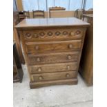 AN OAK JACOBEAN STYLE CHEST OF FIVE DRAWERS, 27.5" WIDE