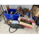 AN ASSORTMENT OF TOOLS TO INCLUDE SAWS, TROWELS AND A MITRE SAW ETC