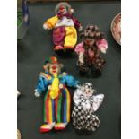 FOUR DECORATIVE CLOWN DOLLS