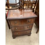 A REPRODUCTION MAHOGANY AND CROSSBANDED BOWFRONTED CHEST OF THREE DRAWERS, 20" WIDE