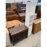 AN EARLY 20TH CENTURY OAK THREE PANEL LINEN CHEST, 36" WIDE, AND A NARROW WHITE UNIT