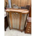 A SHINY WALNUT INVERTED BOWFRONTED CHINA CABINET ON CABRIOLE LEGS, 39" WIDE