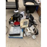 AN ASSORTMENT OF ELECTRICAL ITEMS TO INCLUDE KETTLES, TELEPHONES, IRONS AND A CAR STEREO ETC