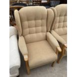 A MODERN BEECH DARLINGTON WINGED ARMCHAIR