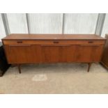 A RETRO TEAK SIDEBOARD ENCLOSING THREE DRAWERS, TWO SIDE CUPBOARDS AND ONE CENTRAL CUPBOARD WITH