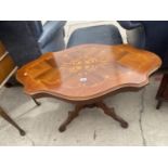 AN OVAL ITALIAN STYLE COFFEE TABLE