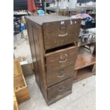 AN EARLY 20TH CENTURY FOUR DRAWER FILING CABINET