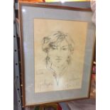 A SIGNED SKETCH OF A WOMANS HEAD AND SHOULDERS