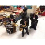 FOUR VARIOUS MUSICIAN JAZZ BAND FIGURINES