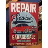 A TIN SIGN 20CM X 30CM - GARAGE SALE