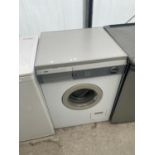 A WHITE ZANUSSI WASHING MACHINE