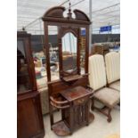 A VICTORIAN STYLE HARDWOOD MIRRORED HALL COAT/STICK STAND WITH MIRRORED BACK, CUPBOARDS AND DRAWER