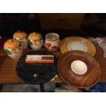 A SELECTION OF ITEMS TO INCLUDE A LAZY SUSAN CHEESE BOARD A MARBLE SERVING BOARD AND CANNISTERS