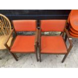 A PAIR OF RETRO TEAK OPEN ELBOW CHAIRS