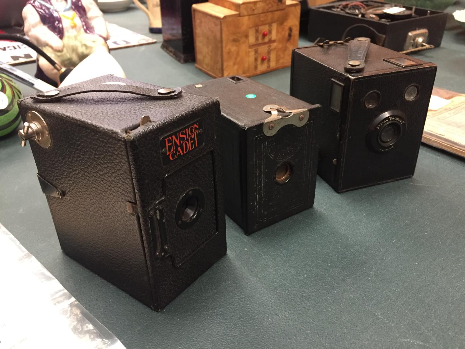 THREE BOX CAMERAS TO INCLUDE AN ENSIGN CADET