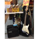 A BURSWOOD ELECTRIC GUITAR TOGETHER WITH A LANEY AMPLIFIER