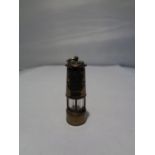 A MINIATURE BRASS MINERS STYLE LAMP PENDANT