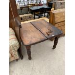 AN EDWARDIAN WIND-OUT DINING TABLE WITH CANTED CORNERS, 39.5" X 40" (EXTRA LEAF 16"), COMPLETE