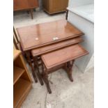 A NEST OF THREE MODERN HARDWOOD TABLES