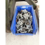A BLUE PLASTIC CONTAINER OF METAL BRACKETS ETC