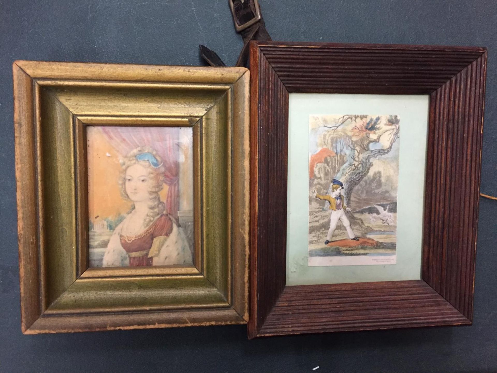 TWO WOODEN FRAMED PRINTS TO INCLUDE A YOUNG GIRL AND A BOY THROWING STONES IN THE SEA