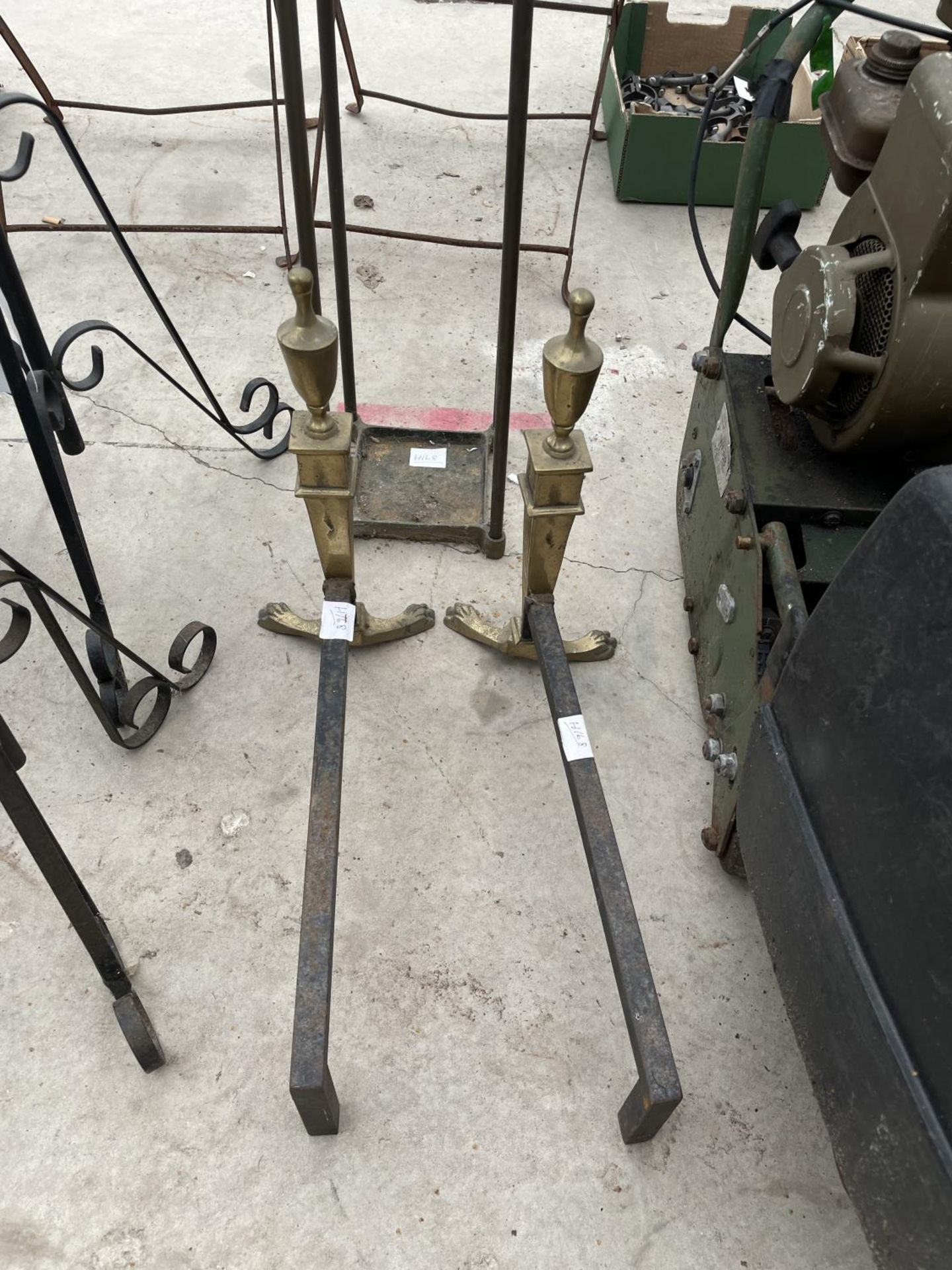 AN ASSORTMENT OF ITEMS TO INCLUDE TWO IRON PLANT STANDS, DECORATIVE BRASS FIRE DOGS AND A STICK - Image 3 of 4