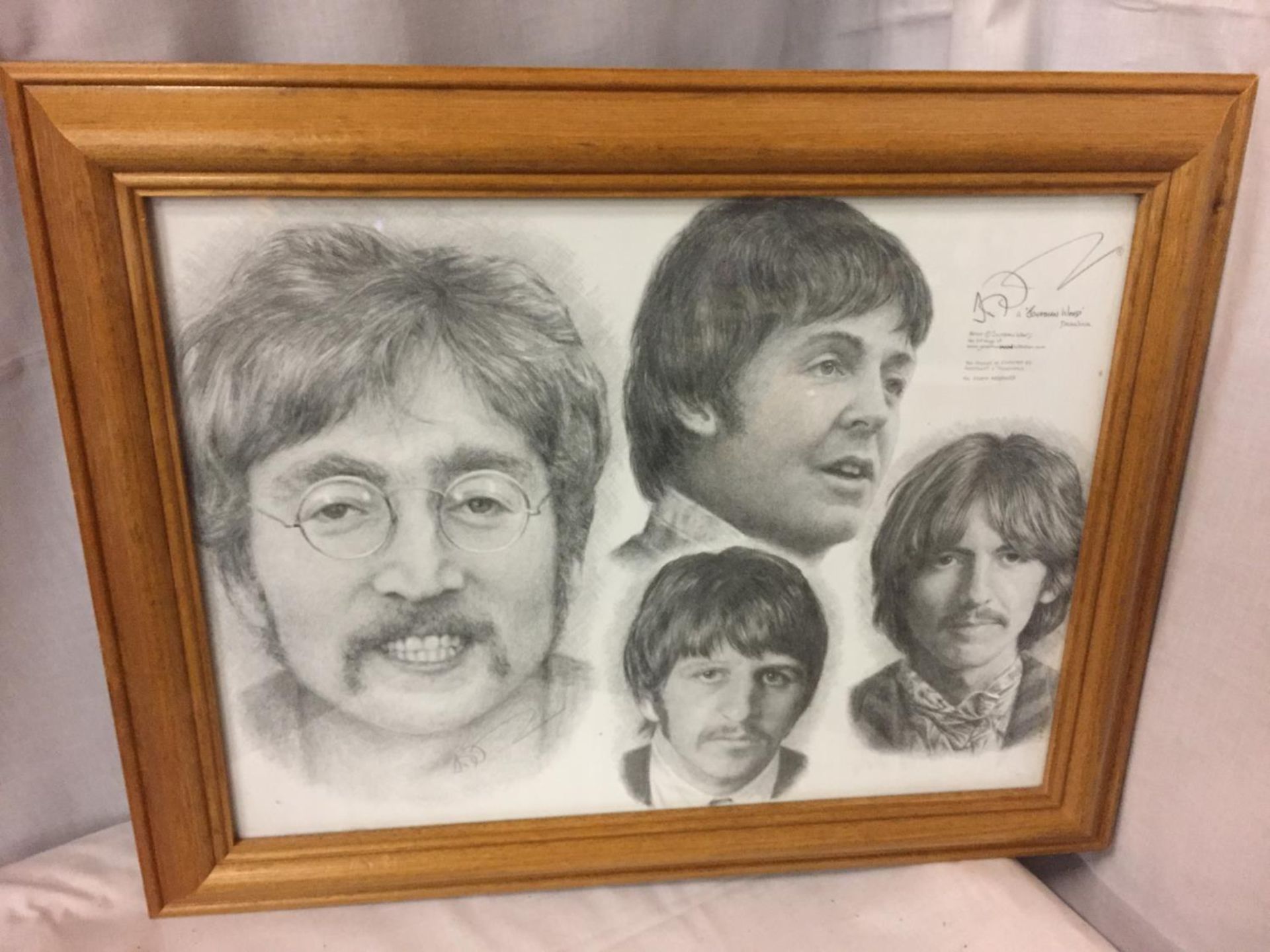 A FRAMED PRINT OF THE BEATLES