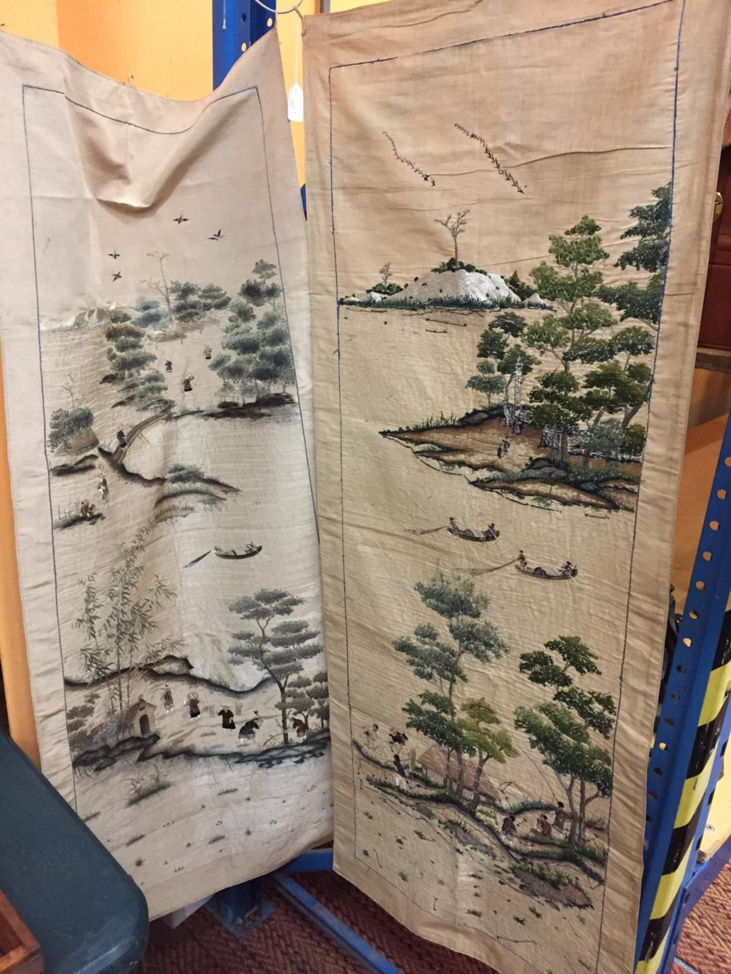 TWO ORIENTAL SILK WALL HANGINGS DEPICTING TRADITIONAL FISHING SCENES BOTH APPROX 140CM X 58CM