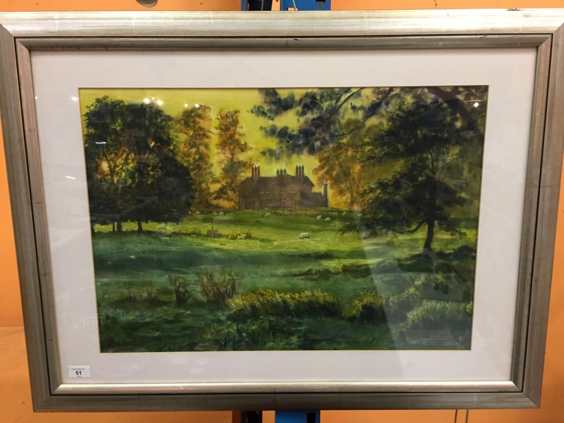 A FRAMED WATERCOLOUR OF THE OLD HALL TATTON PARK