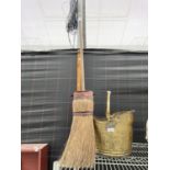 A BRASS COAL BUCKET AND A FURTHER SWEEPING BROOM