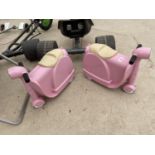 A PAIR OF MATCHING PINK SKOOT CHILDRENS RIDE ON CASES