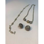 THREE SILVER ITEMS TO INCLUDE A SILVER BRACELET, A SILVER CHAIN WITH THREE CHARMS AND A PAIR OF