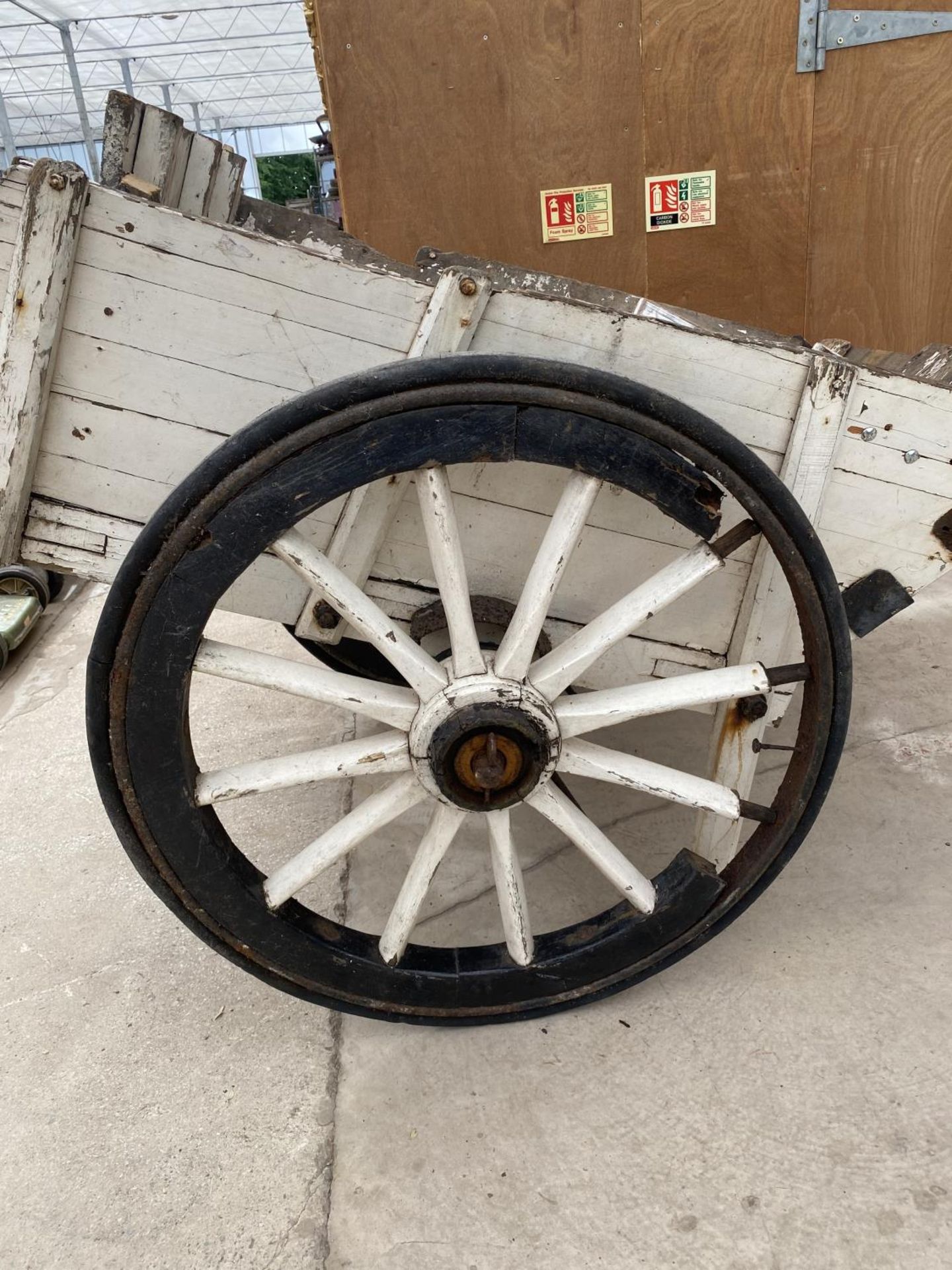 A VINTAGE PAINTED WOODEN MARKET GARDENERS TWO WHEELED TROLLEY WITH METAL BANDED WHEELS AND TWO - Image 6 of 12