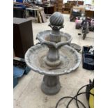 A DECORATIVE TWO TIER WATER FEATURE