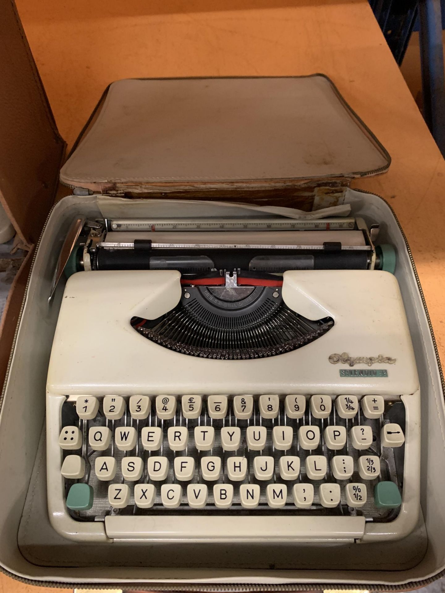 A VINTAGE LADA CASED SEWING MACHINE AND A VINTAGE CASED OLYMPIA SPLENDID 33 TYPEWRITER - Image 3 of 3