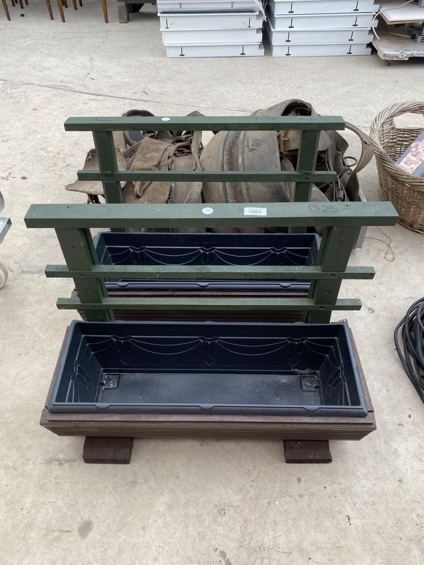 A PAIR OF WOODEN PLANTER TROUGHS