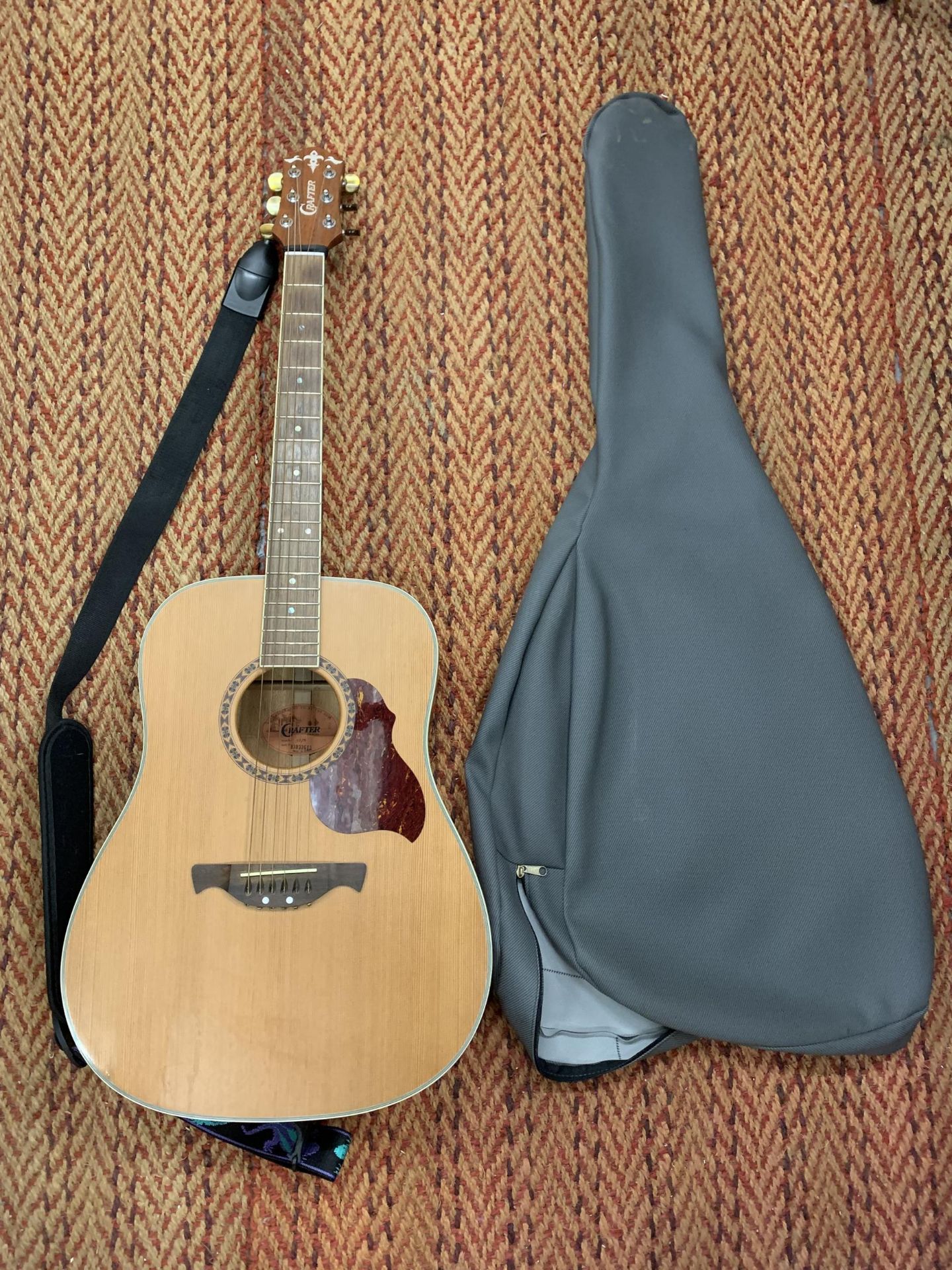 A CRAFTER ACOUSTIC GUITAR SERIAL NUMBER 03033613 WITH CARRY CASE