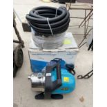 A NEW 900W IRIGATION WATER PUMP WITH TWO ROLLS OF NEW PIPE