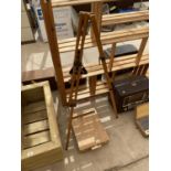 A WOODEN ARTISTS EASEL AND BOX