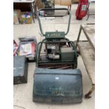 A VINTAGE ATCO PETROL LAWN MOWER WITH GRASS BOX