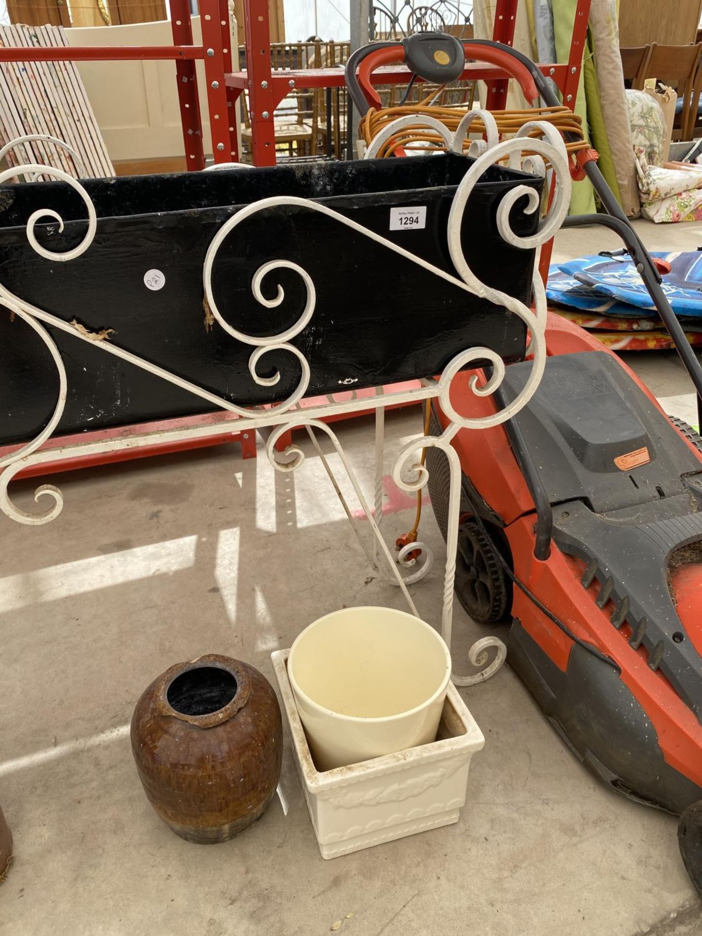AN ASSORTMENT OF GARDEN PLANTERS TO INCLUDE A TROUGH WITH A DECORATIVE WROUGHT IRON STAND - Image 2 of 4