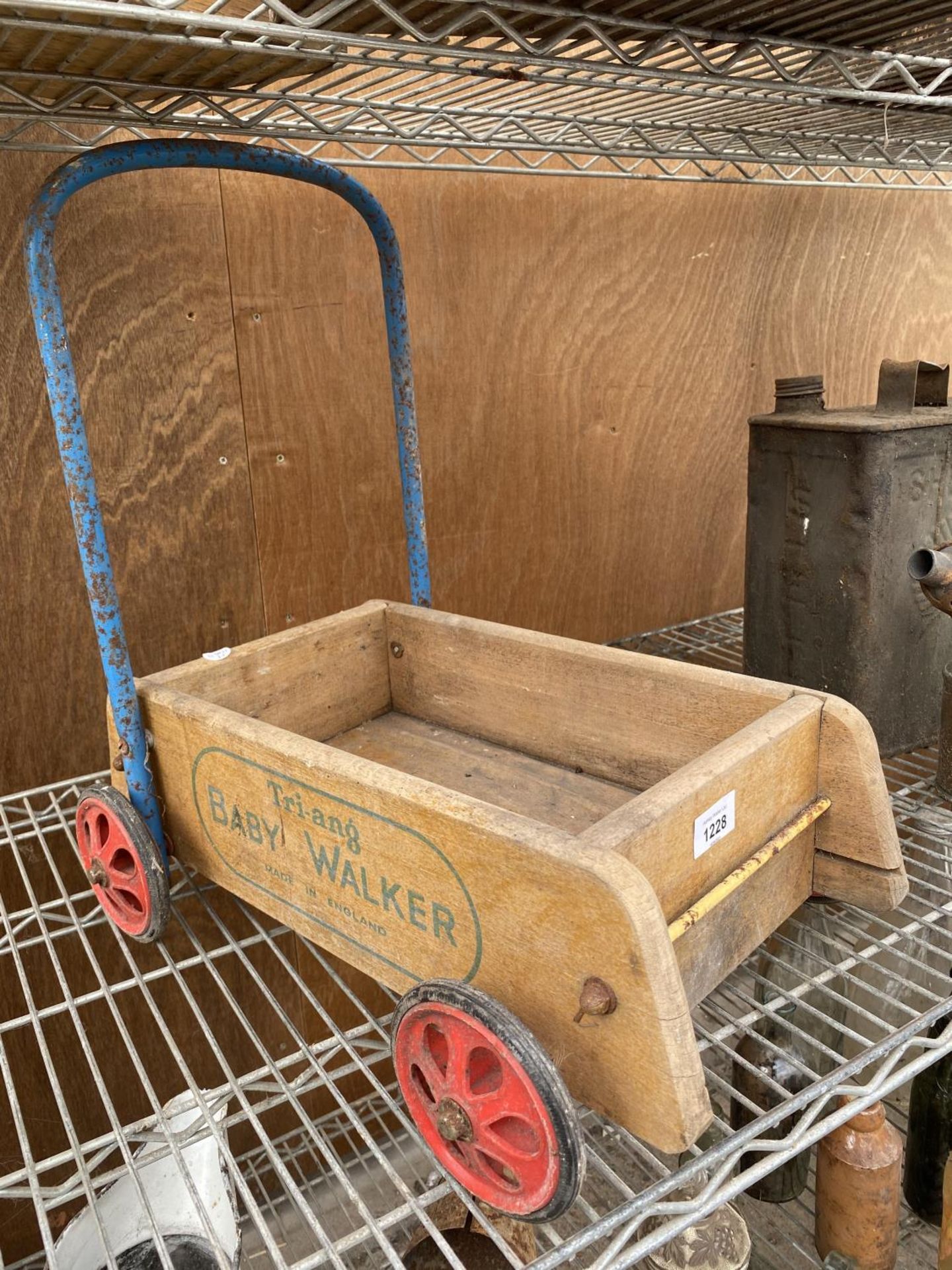 A VINTAGE CHILDRENS PUSH ALONG CART