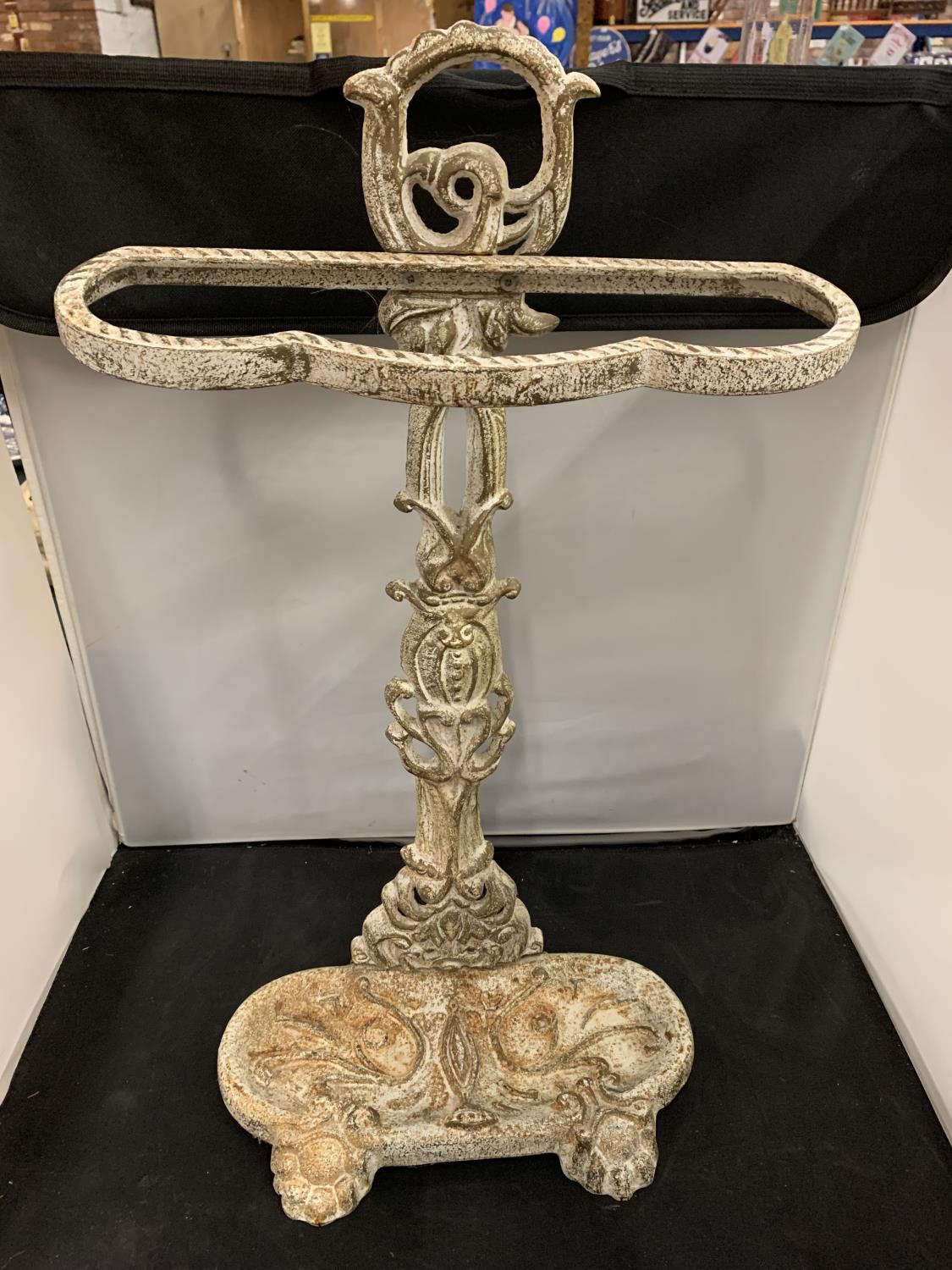 A CAST IRON STICK/UMBRELLA STAND