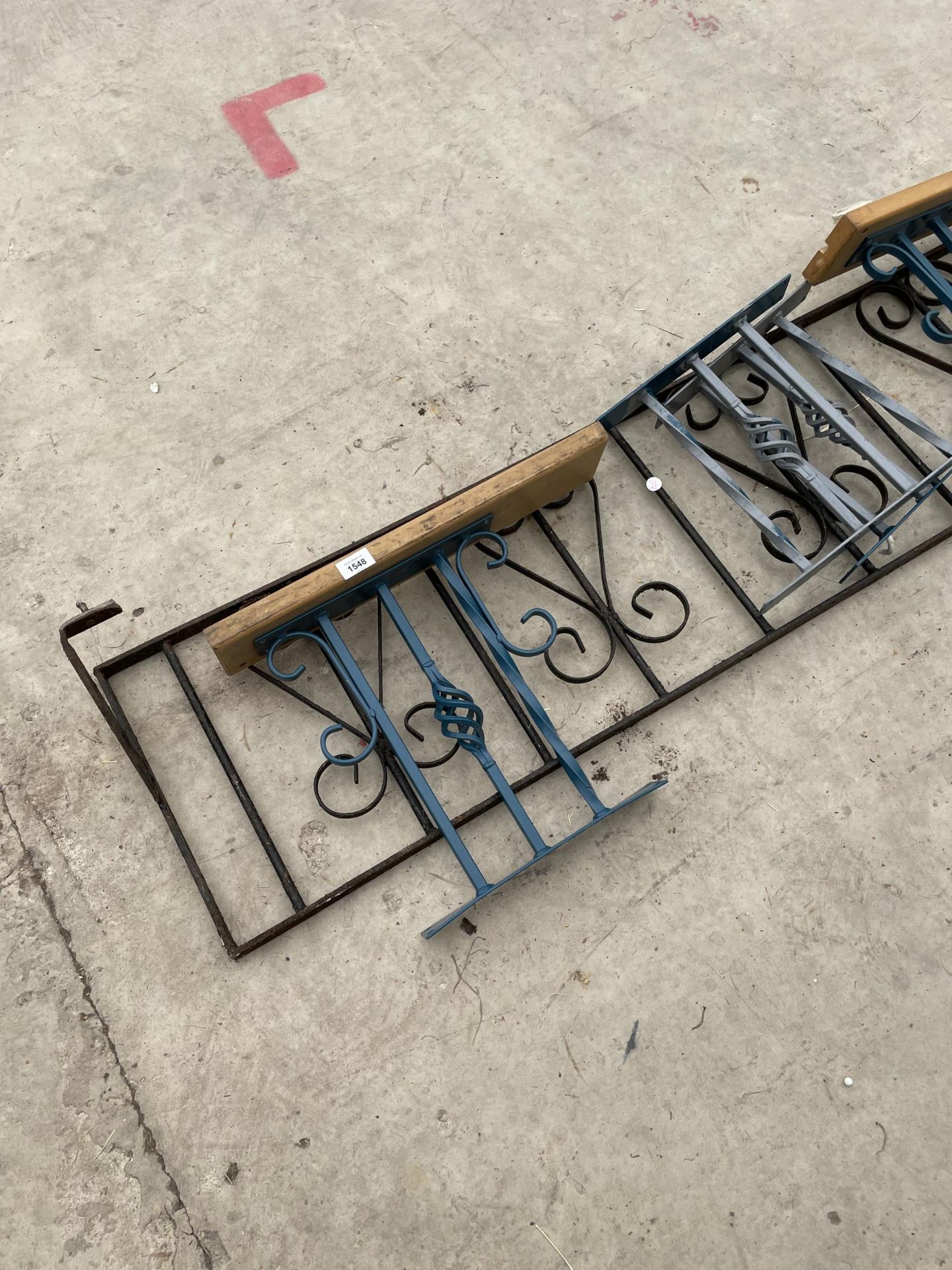 AN ASSORTMENT OF DECORATIVE AND TURNED WROUGHT IRON RAILING PANELS - Image 2 of 3