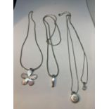 FOUR SILVER NECKLACES WITH PENDANTS TO INLCUDE A PINK PEARLISED FLOWER AND A BAR ETC