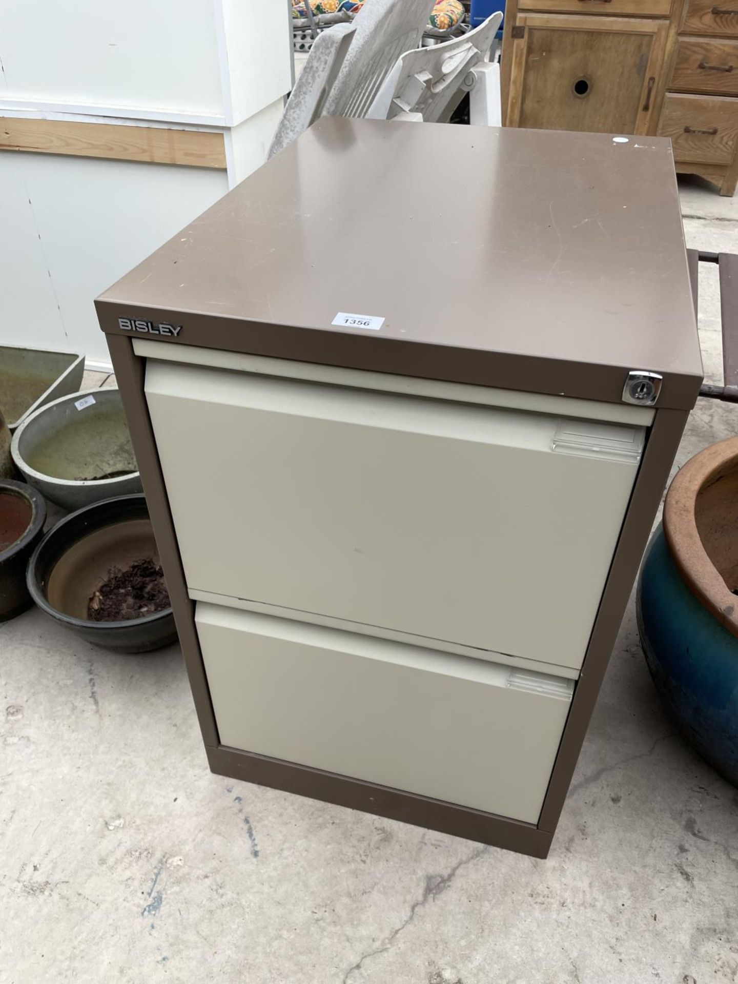 A BISLEY TWO DRAWER METAL FILING CABINET