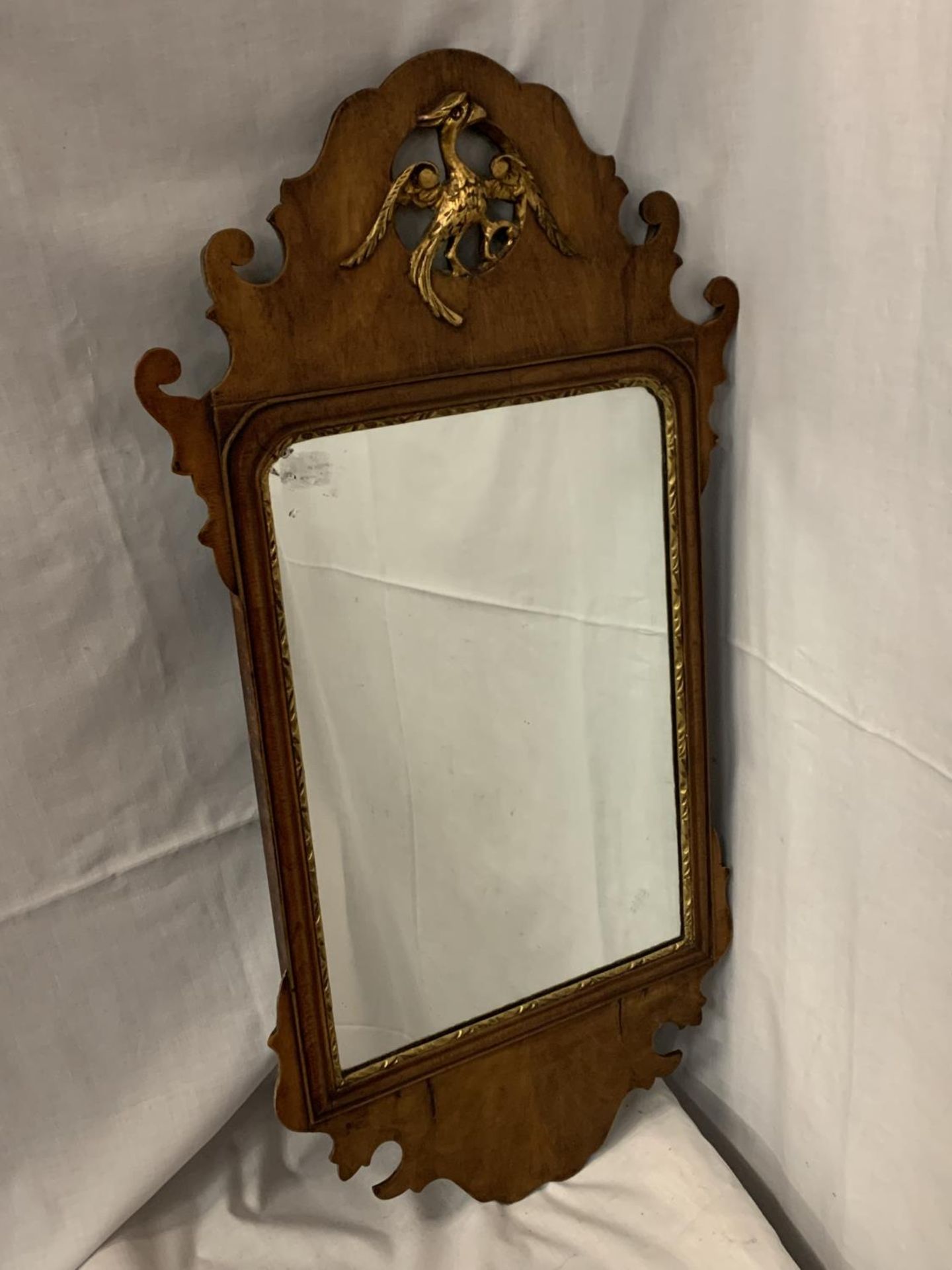 AN ANTIQUE MAHOGANY FRETWORK WALL MIRROR WITH HOHO BIRD, MARKED 1741 LONDON TO REAR