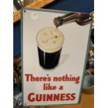 A 'THERE'S NOTHING LIKE A GUINESS' SIGN 20CM X 30CM